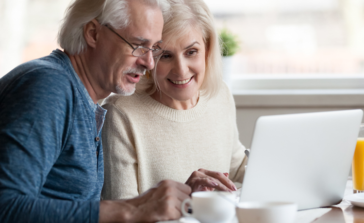illustratie man en vrouw achter laptop